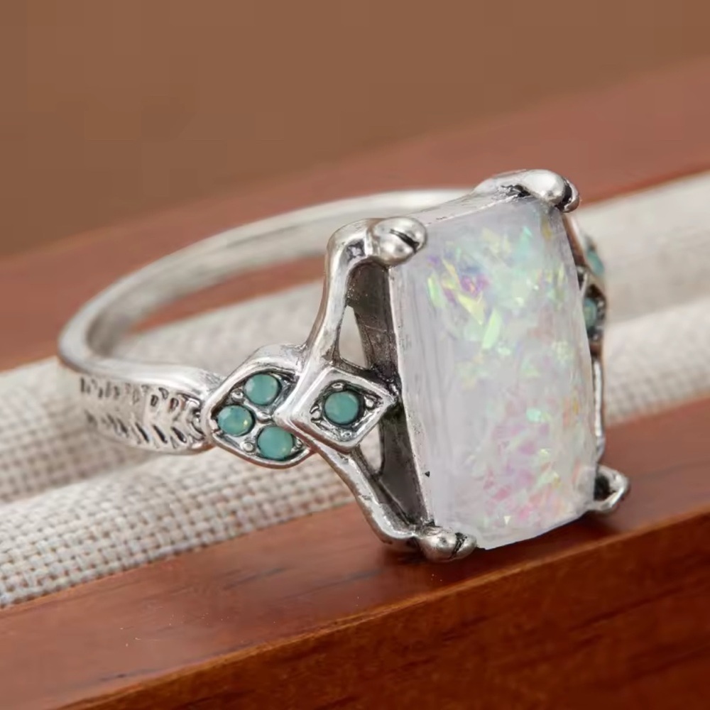 Elegant Silver Opal Ring with Green Accents